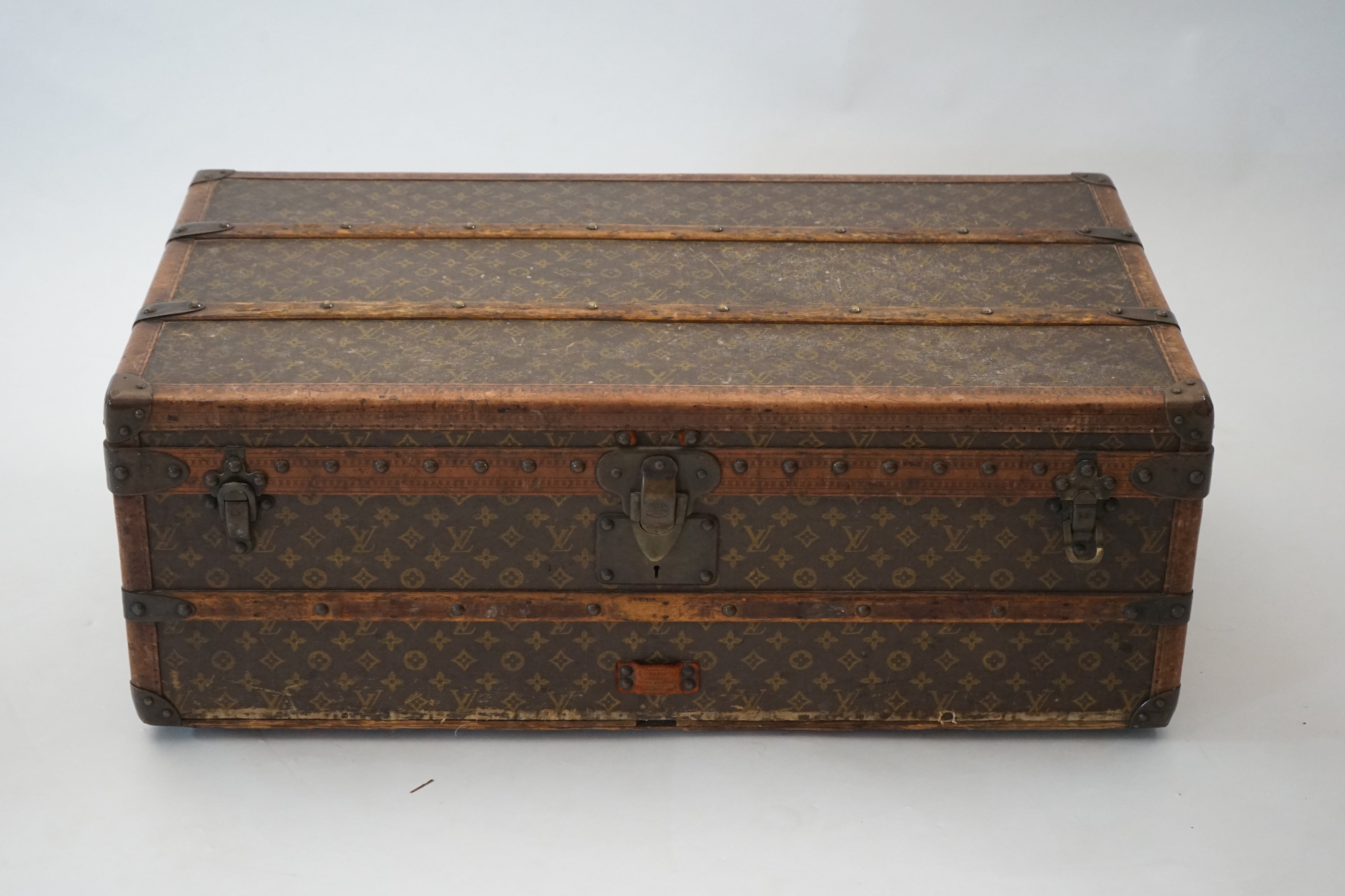 A vintage Louis Vuitton rectangular trunk, width 92cm, depth 52cm, height 34cm